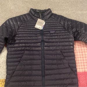 Brand new Patagonia alp light down jacket smolder blue
